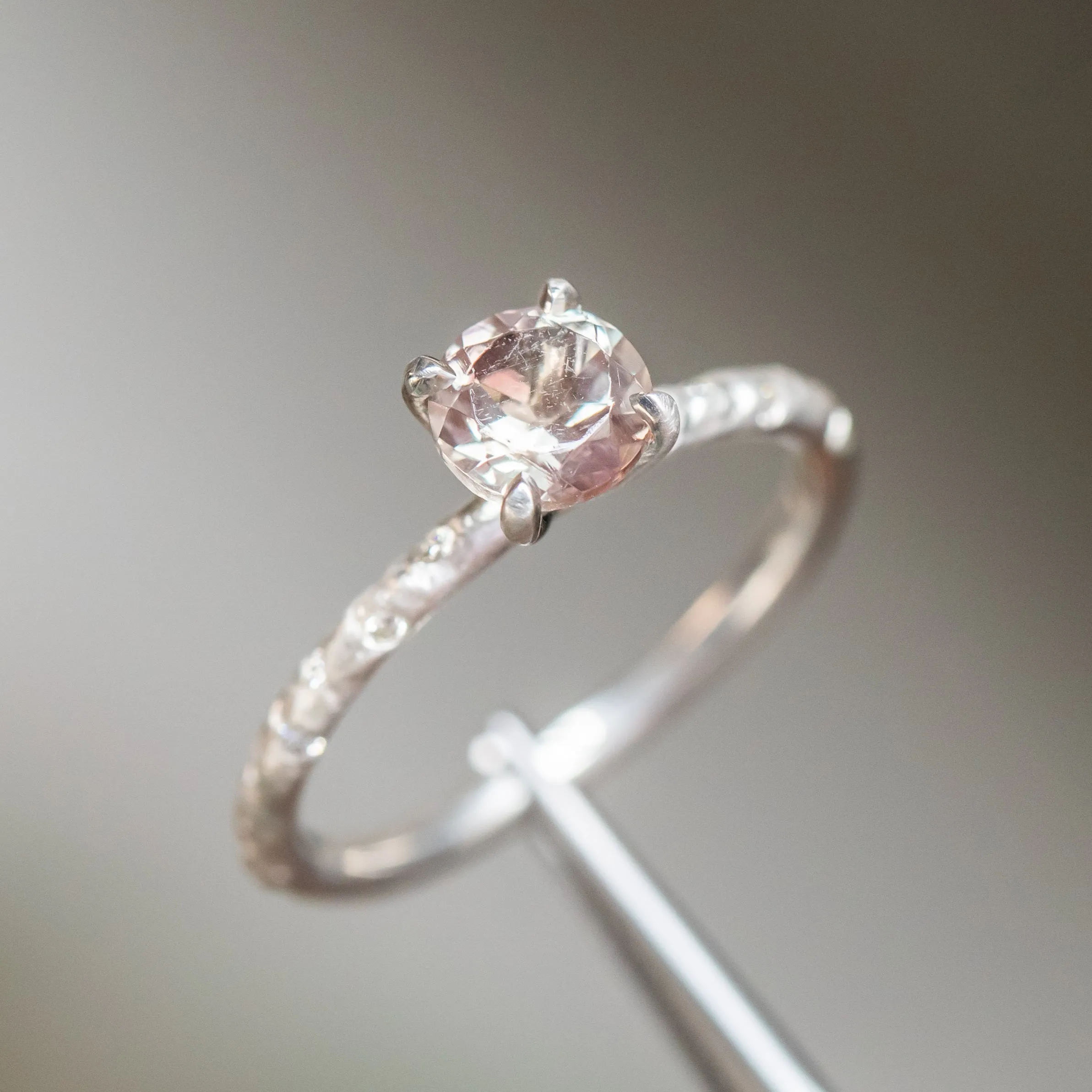 0.84ct Round Oregon Sunstone Solitaire Ring in Sterling Silver with Embedded Diamonds in Evergreen Texture